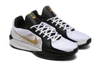 Angled view of the pair showing white laces and gold side details