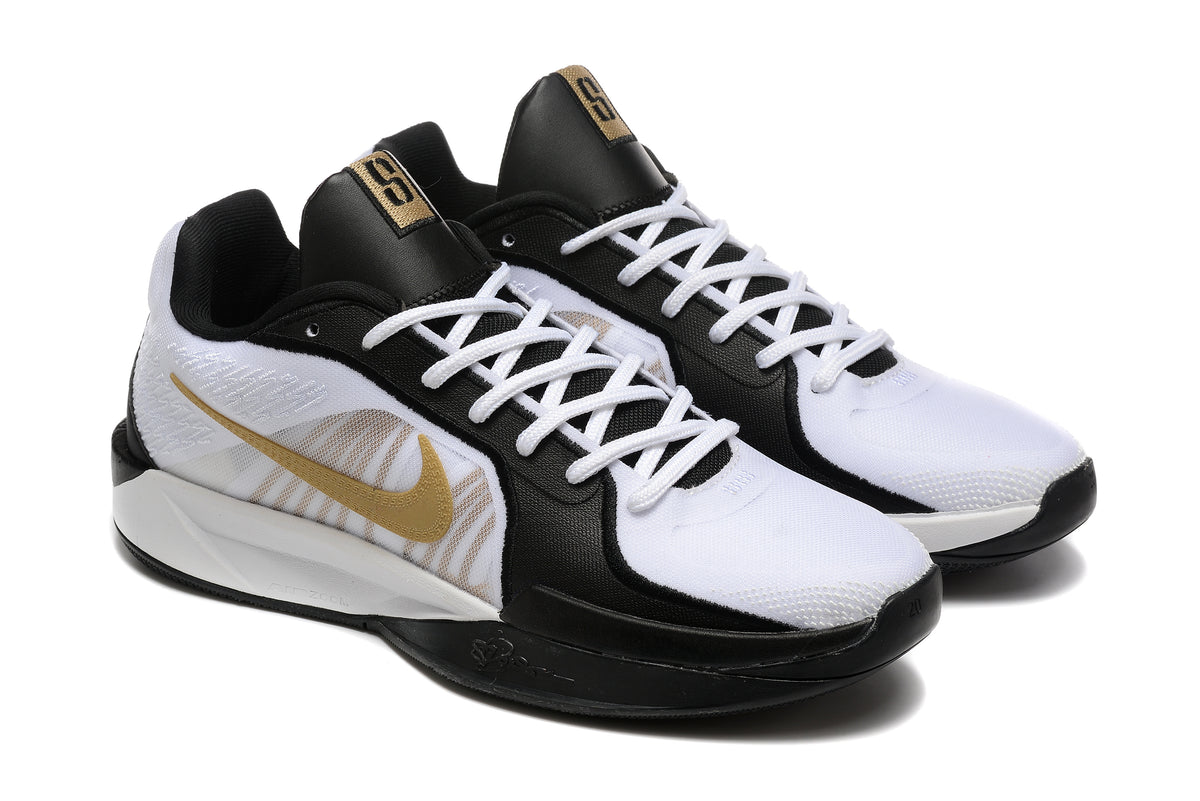 Angled view of the pair showing white laces and gold side details