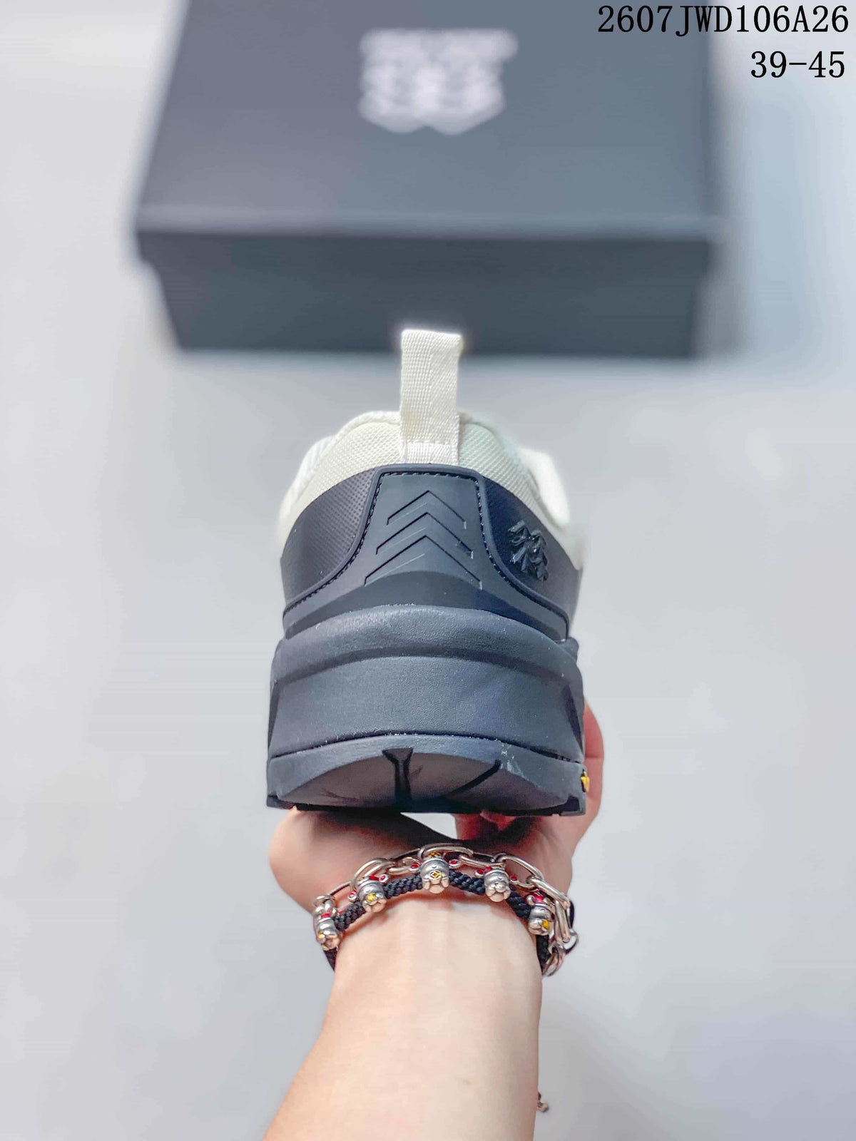 Rear view of the black heel structure and outsole on the hiking shoe, with source text showing 2607JWD106A26 and sizes 39–45.