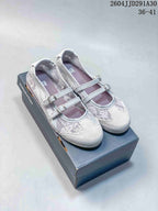 Pair of pale lavender Mary Jane sneakers with patterned panels