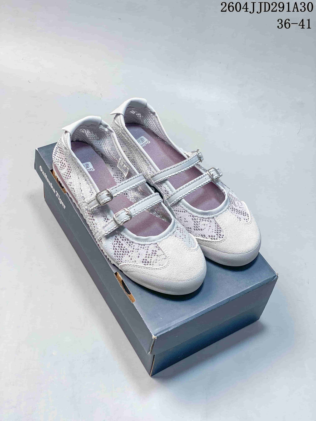 Pair of pale lavender Mary Jane sneakers with patterned panels