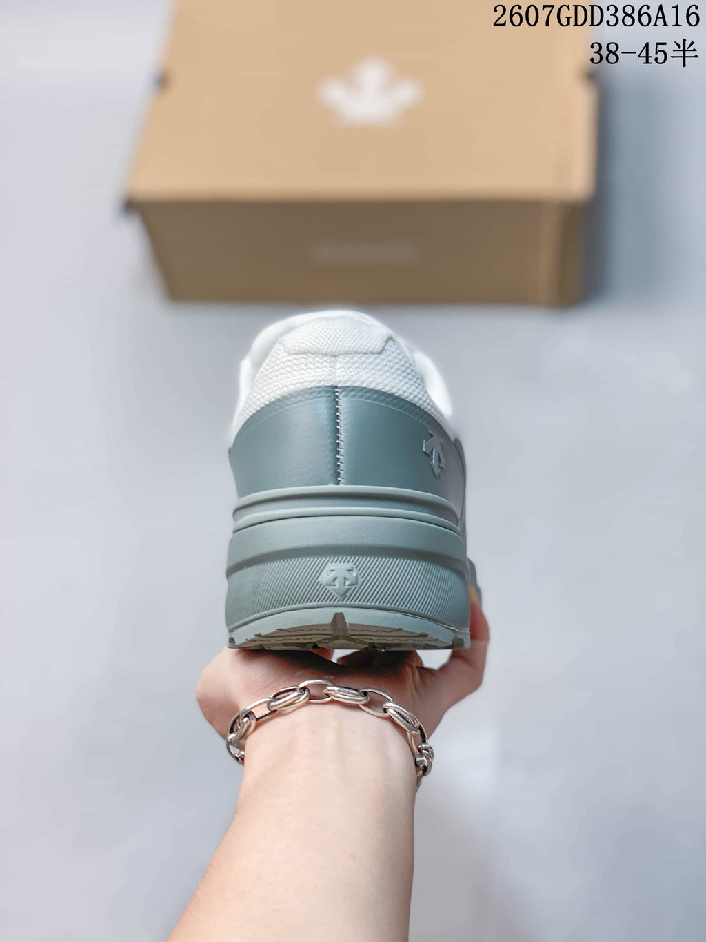 Rear view of the sneaker showing the layered gray heel structure, padded collar, and outsole.