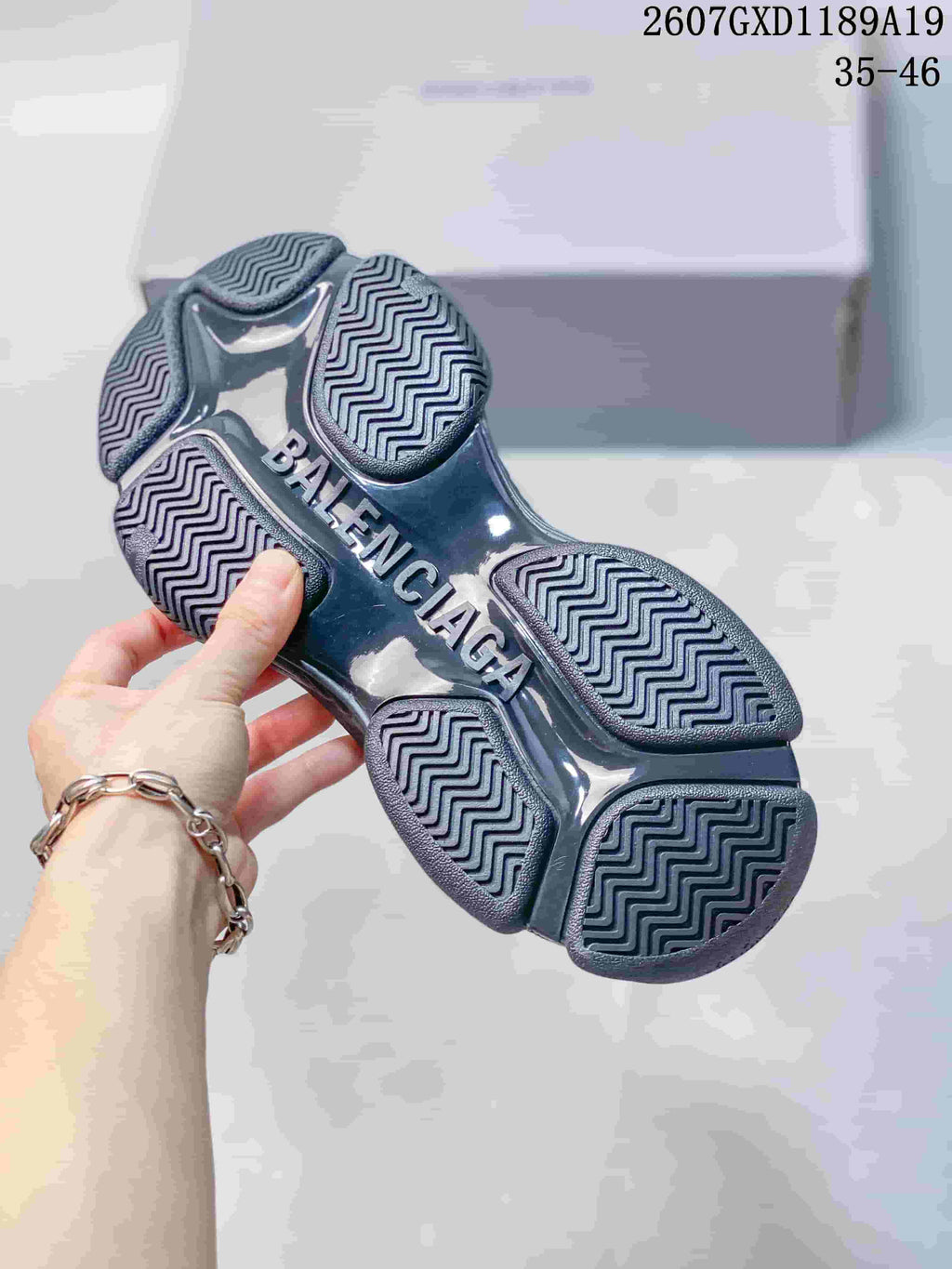 Underside of a Balenciaga sneaker showing the segmented outsole and zigzag tread pattern.