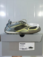 Balenciaga Radar sneaker displayed on its box; the label shows Radar Sneaker W, Khaki/Yellow, and EU 40.