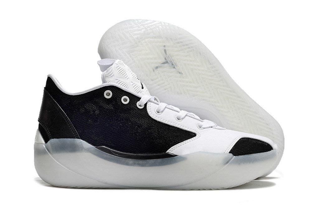 Side view of black and white Jordan Luka 39 shoes with outsole visible