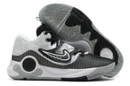 Gray, black, and white Nike KD basketball shoes with a patterned outsole.