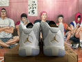 Rear view of white and silver Jordan basketball shoes with gold-tone heel logos