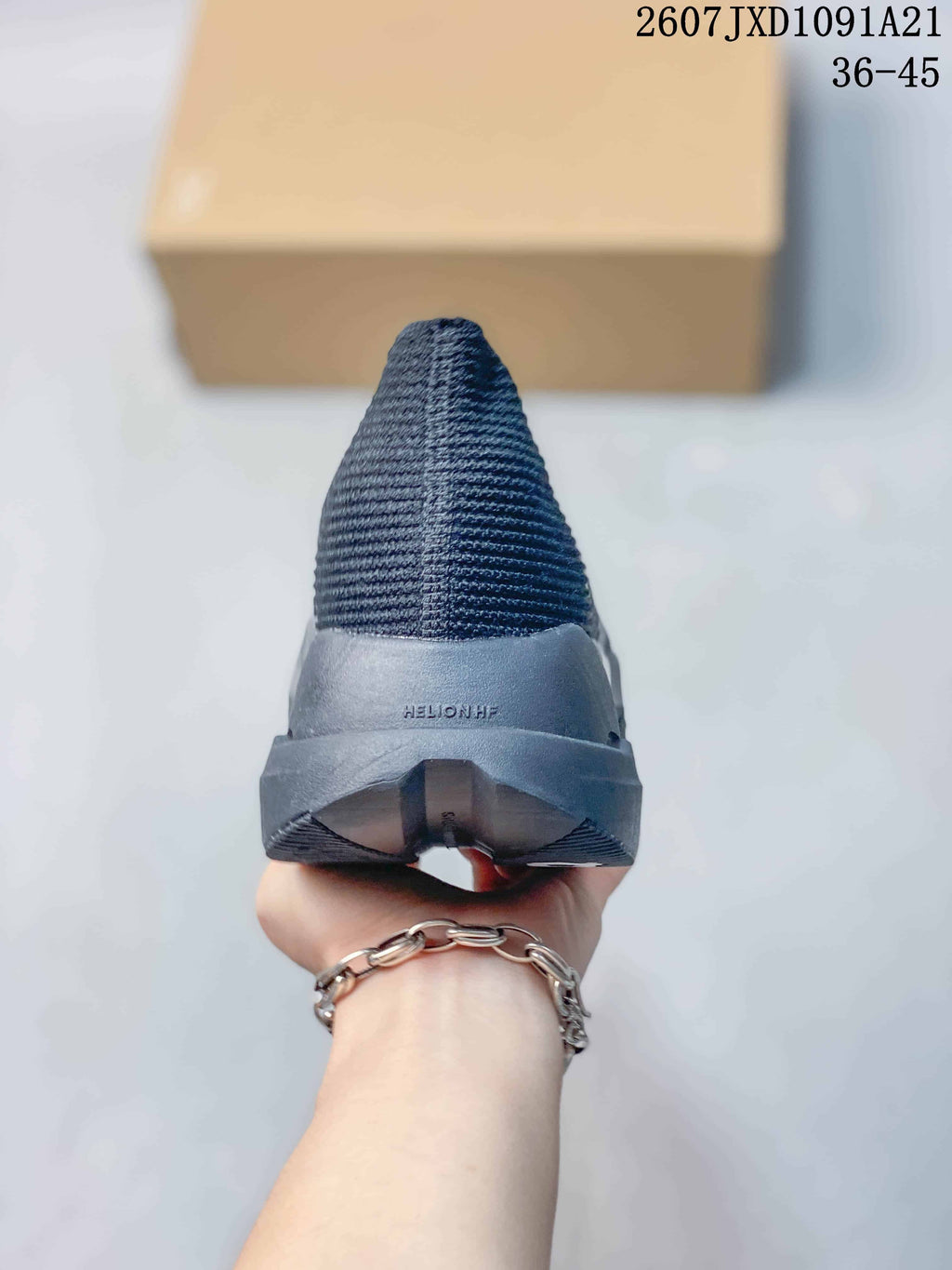 Rear view showing the ribbed upper, heel structure, and split-style outsole design.