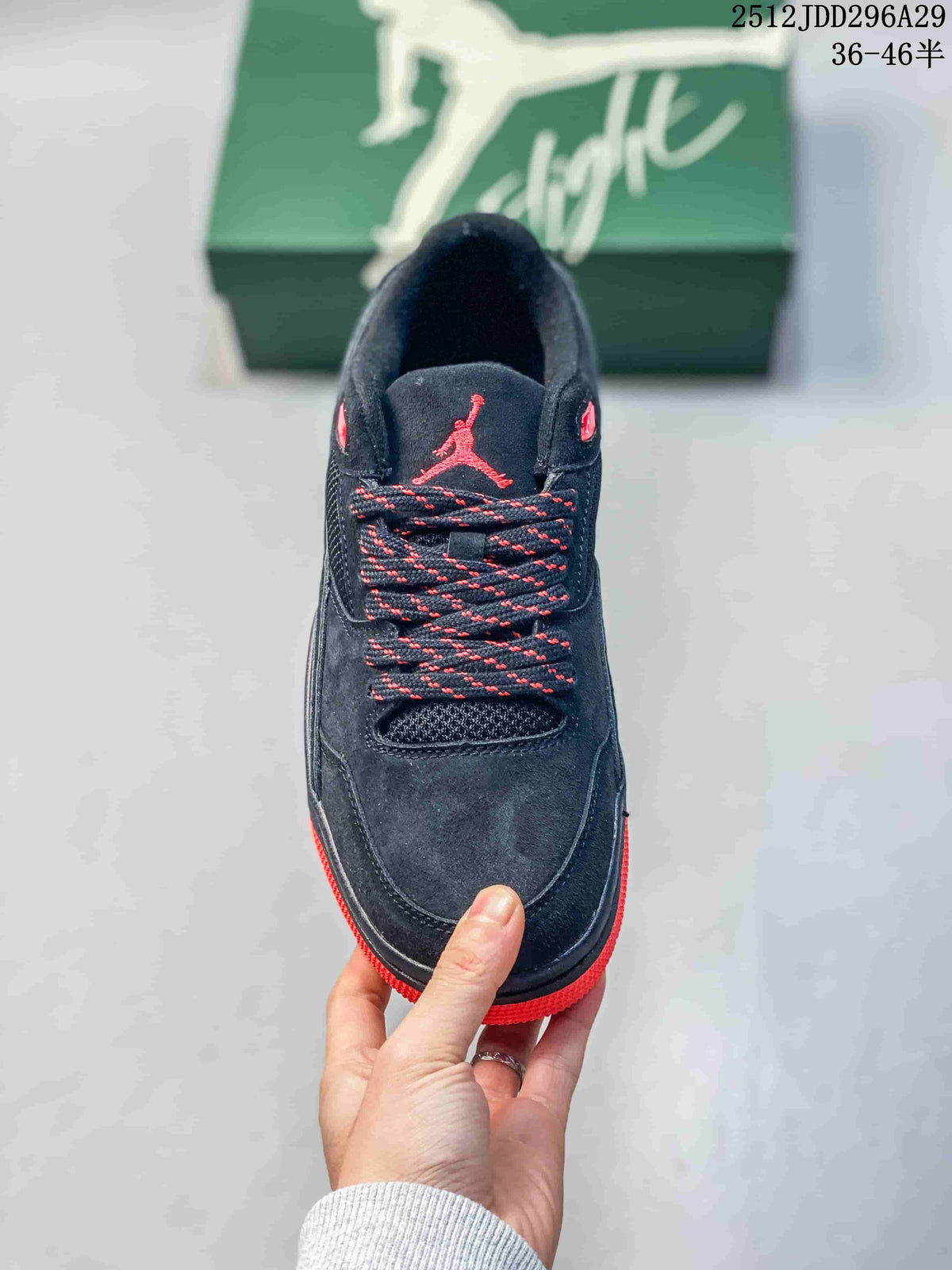 Top view showing the black upper, red-and-black laces, tongue logo and toe panel.