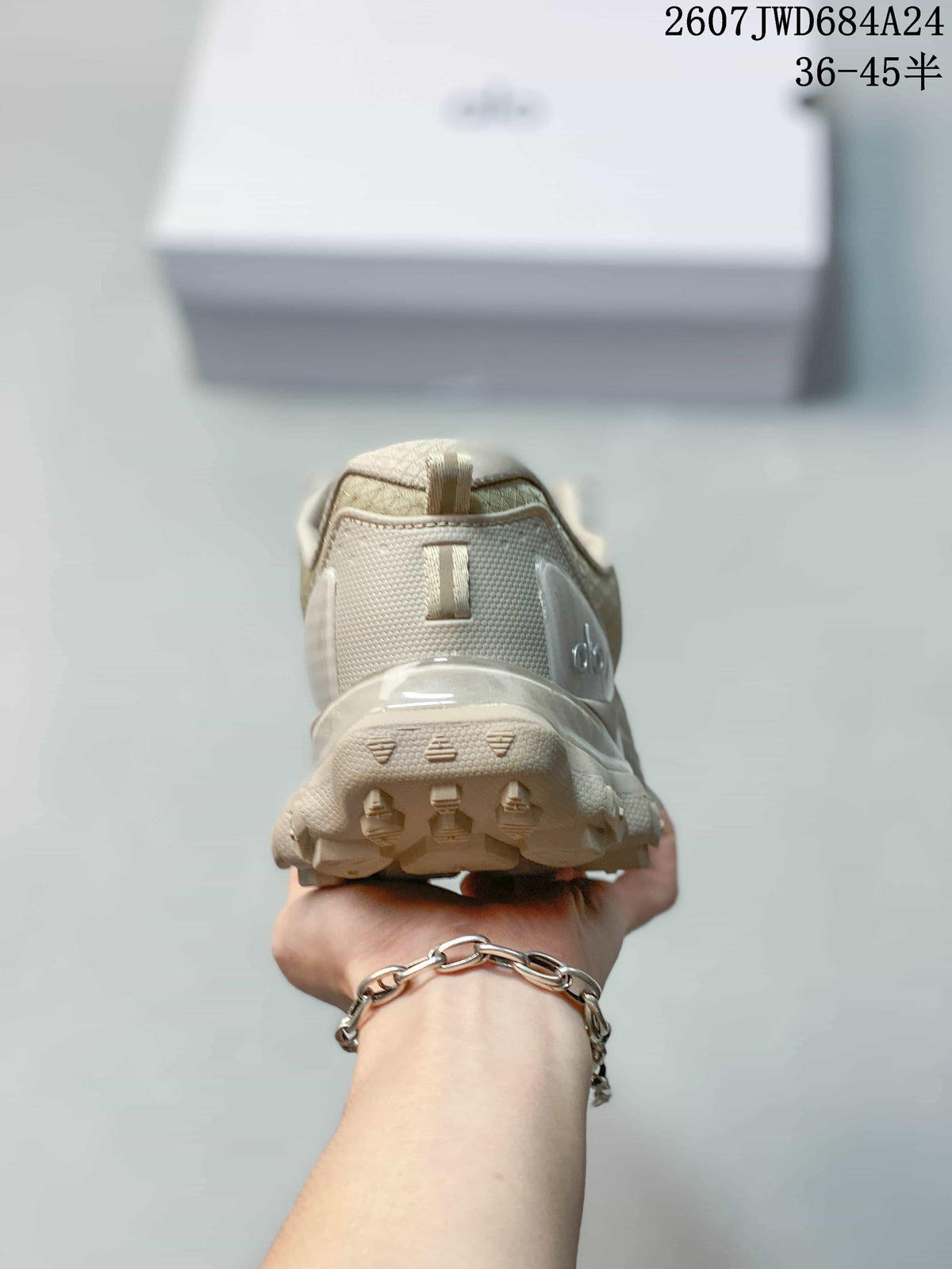 Rear view of the sneaker showing the padded heel collar, pull tab, and textured heel outsole.