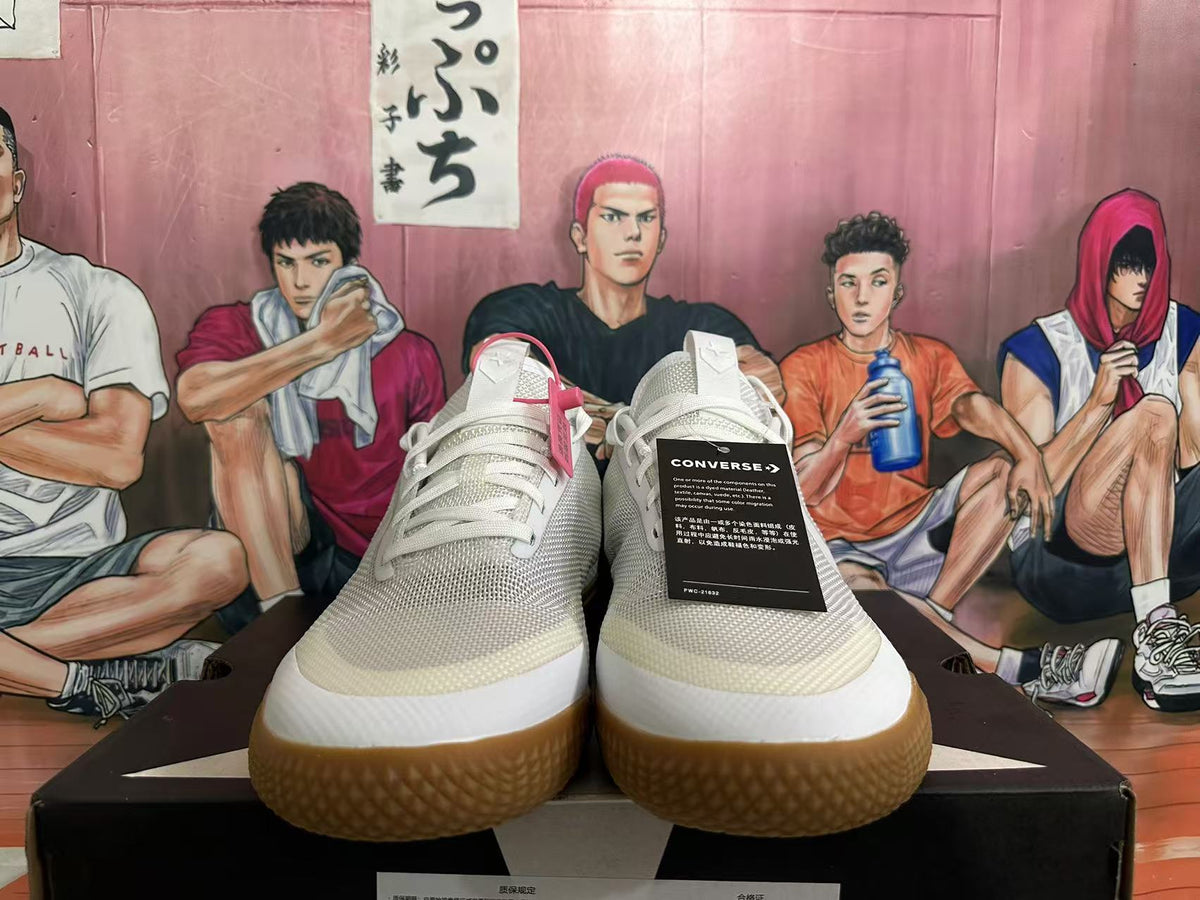 Front view of white Converse Star Series lace-up sneakers with gum-colored outsoles