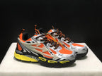 Three-quarter view of the pair highlighting the layered upper, lace-up construction, and contrasting outsole.