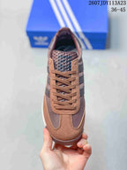 Top view of the brown lace-up adidas sneaker showing the textured tongue, tonal laces, and contrast upper panels.