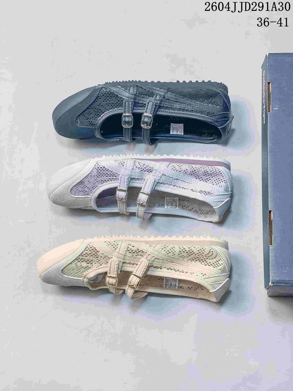 Cream, pale lavender and dark navy sneakers shown from above