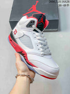 Angled side view of the white Jordan Air Jordan 5 Retro sneaker with red and black accents