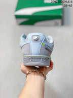 Rear view of the sneaker showing the padded heel, PUMA branding and textured heel section; the image shows size range 36-45.