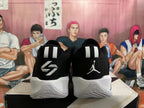 Rear view of black basketball shoes with white heel details