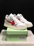 Pair of white and red low-top sneakers displayed on a green shoe box; the box label shows size 40.