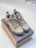 Pair of taupe The North Face Glenclyffe low-top outdoor shoes on a box
