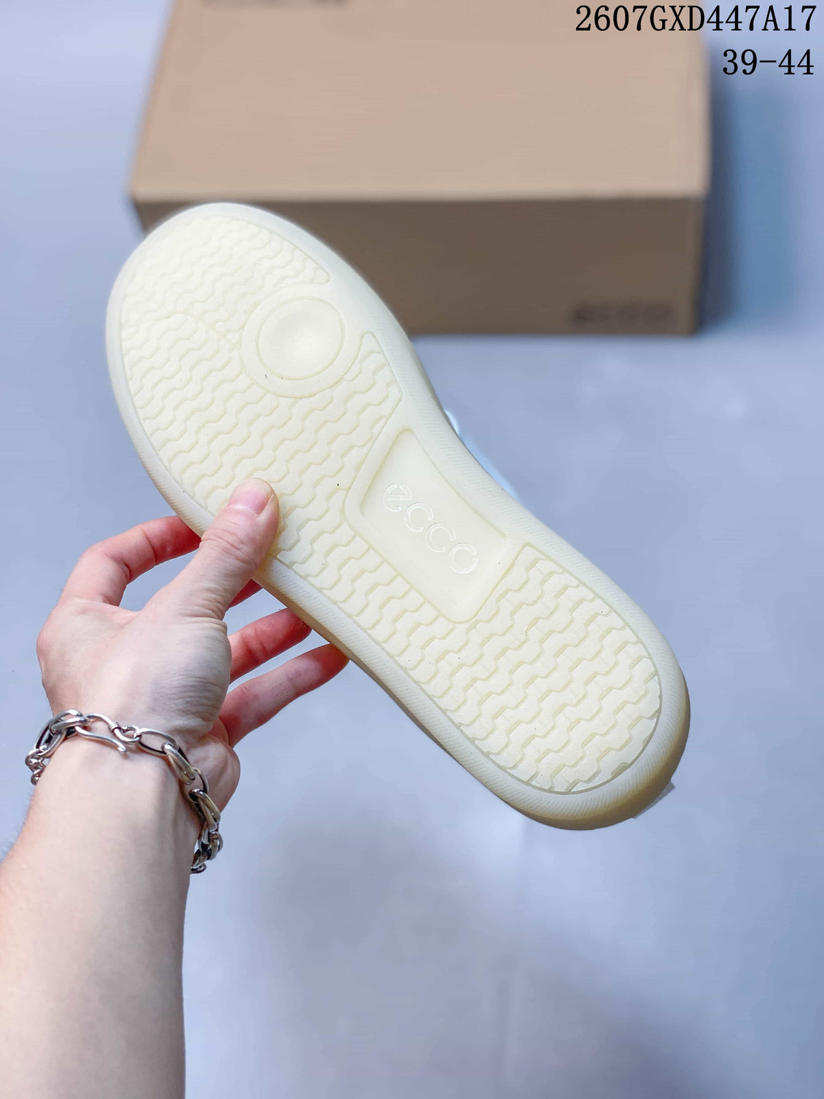 Close-up of the textured translucent off-white outsole with ECCO branding.