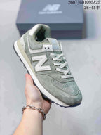 Angled side view showing the green upper, white logo and dark outsole.