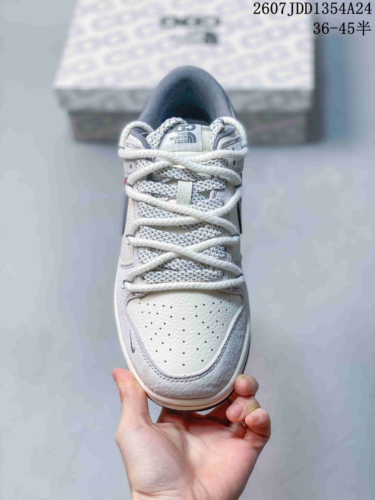 Top view showing the perforated toe box, patterned tongue, and white rope-style laces.