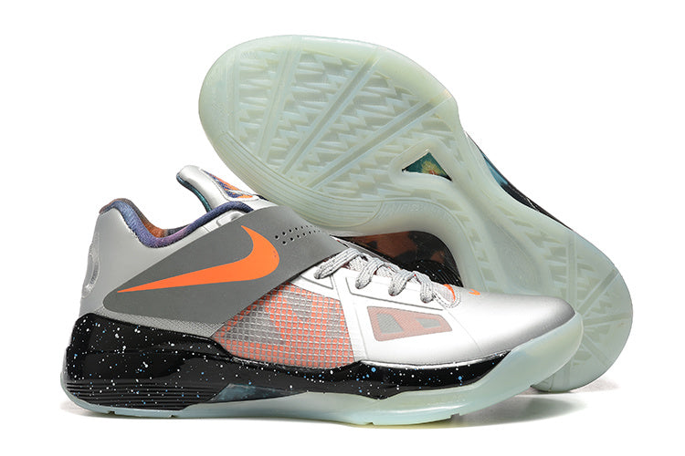 Silver-gray Nike KD 4 shoe with orange accents, a black speckled midsole, and a pale translucent outsole.
