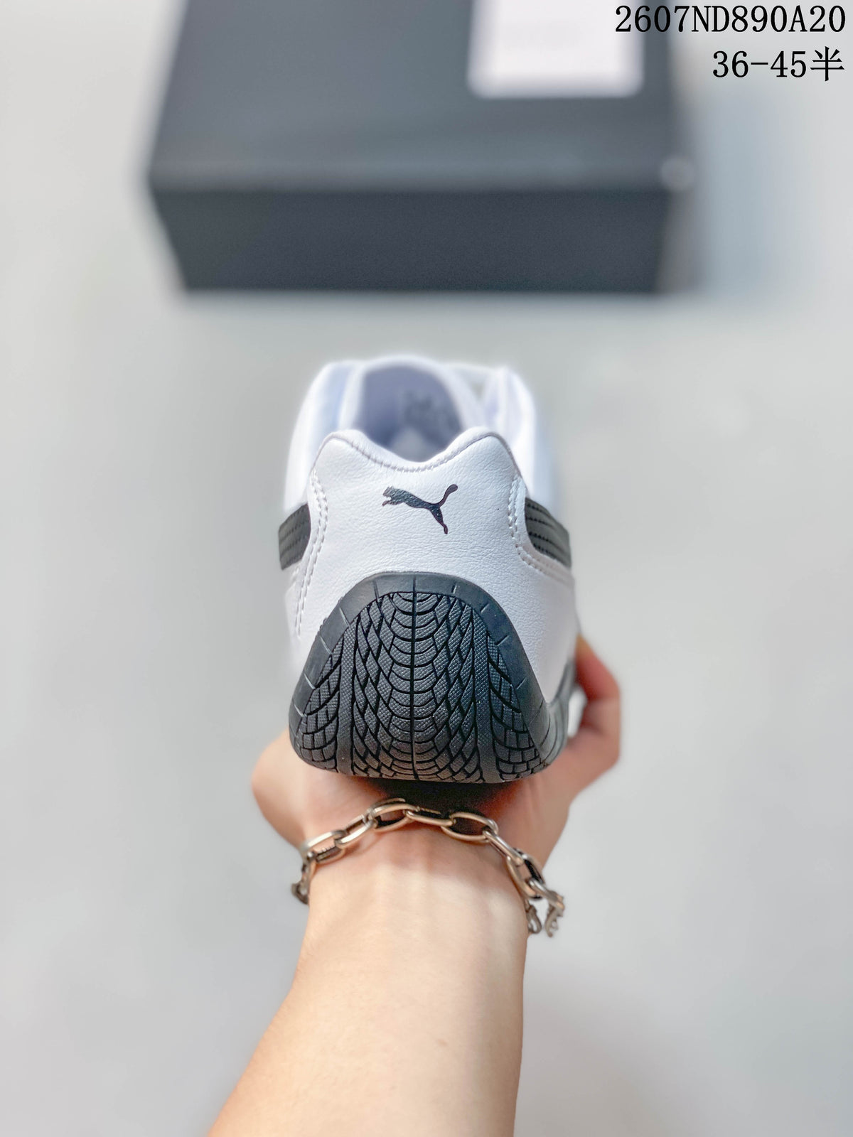 Rear view showing the white heel and black outsole tread