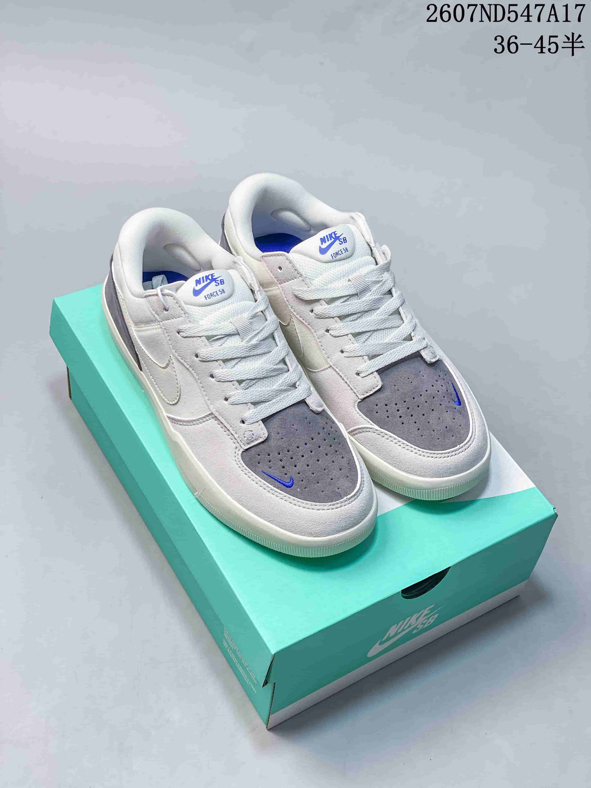 Pair of Nike SB Force 58 sneakers in white, grey and blue displayed on a turquoise shoebox; image text shows style code 2607ND547A17 and size range 36–45.5.
