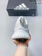 Rear view showing the heel and textured white sole of the sneaker