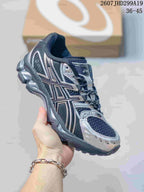 Three-quarter side view of the black and silver ASICS Gel-Nimbus 10.1 sneaker showing its layered retro construction and textured sole.