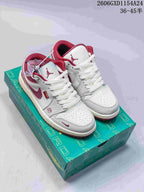 Pair of off-white and light-gray Air Jordan 1 Low sneakers with burgundy details, displayed on a box