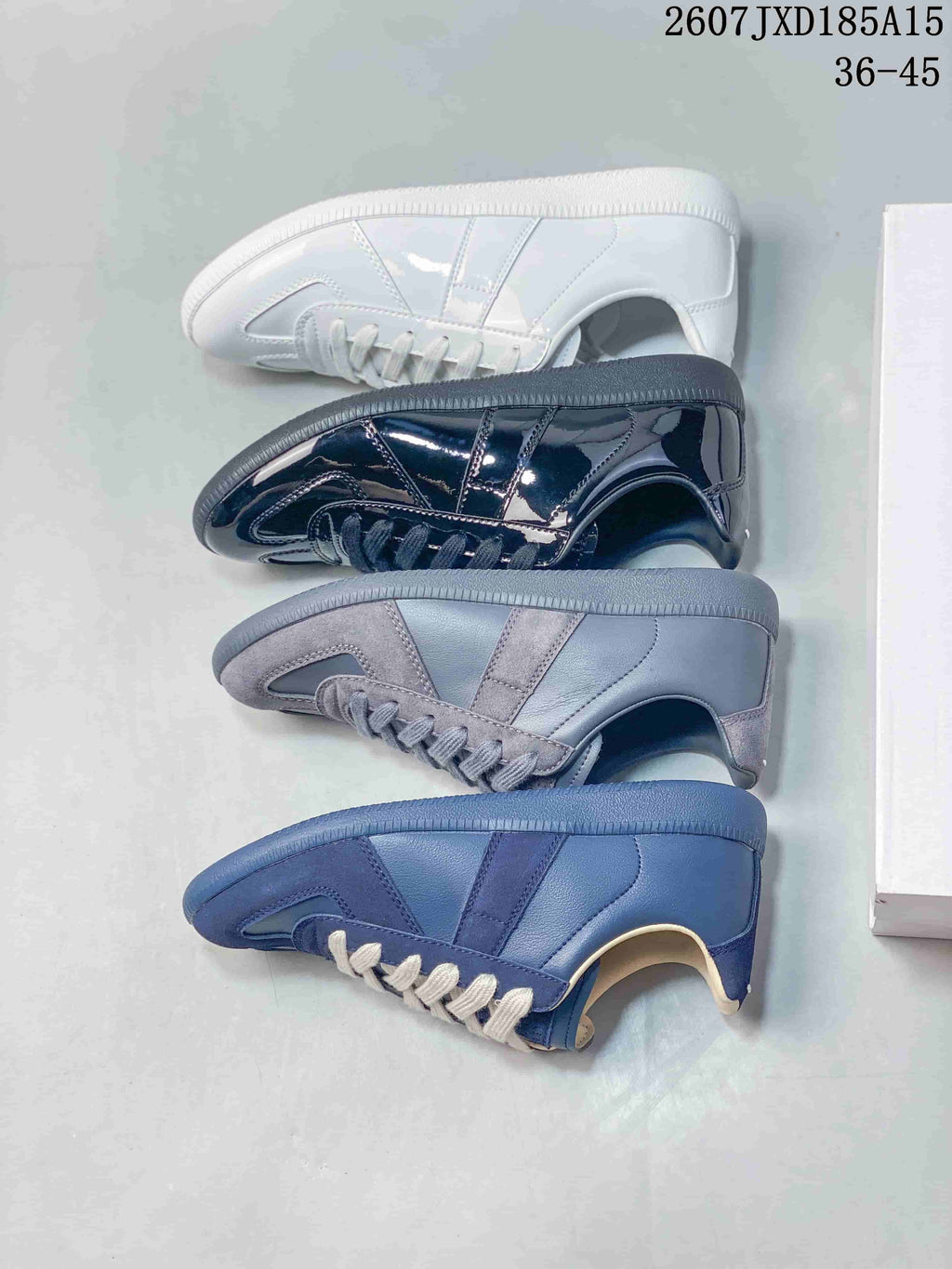 Top-down comparison showing white, glossy black, gray, and blue color options.