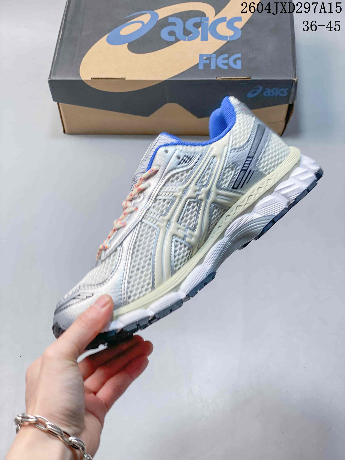 Side profile of a light grey ASICS sneaker with silver-toned overlays and a thick white midsole