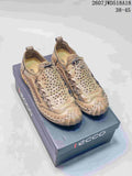 Pair of tan ECCO outdoor sneakers displayed on an ECCO shoe box; style code 2607JWD518A18 and size range 38–45 are visible.