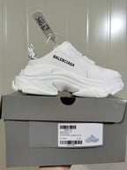 White Balenciaga sneaker displayed on its box; the label shows “524039 W2FS 0125,” “TRIPLE S MULE,” “ALL WHITE,” and size “C 37.”