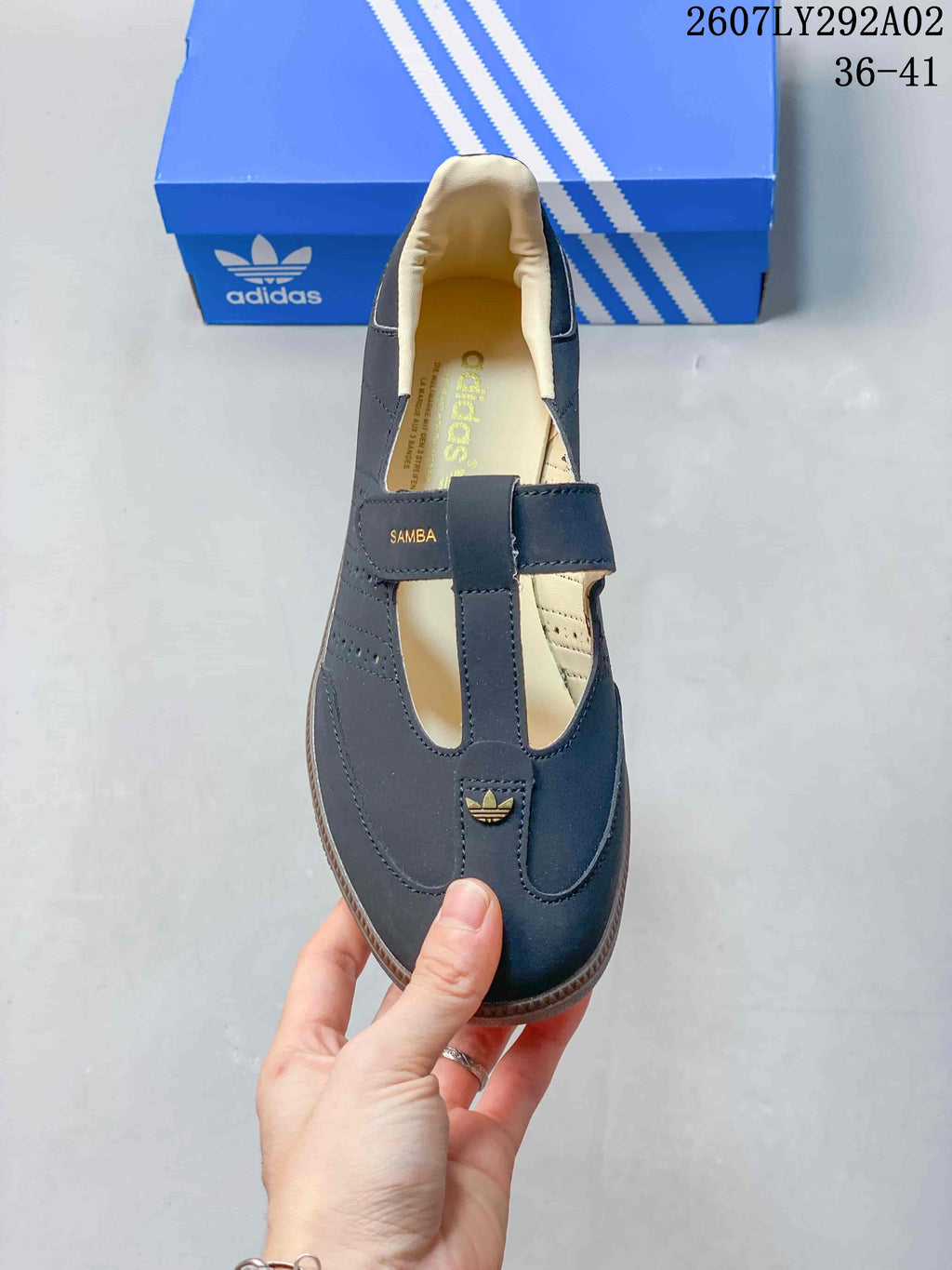 Top view of an Adidas Samba Jane shoe showing the T-strap closure, cream lining, and Samba branding.
