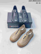 Charcoal gray and beige colorways of ECCO zip-front casual shoes displayed together.