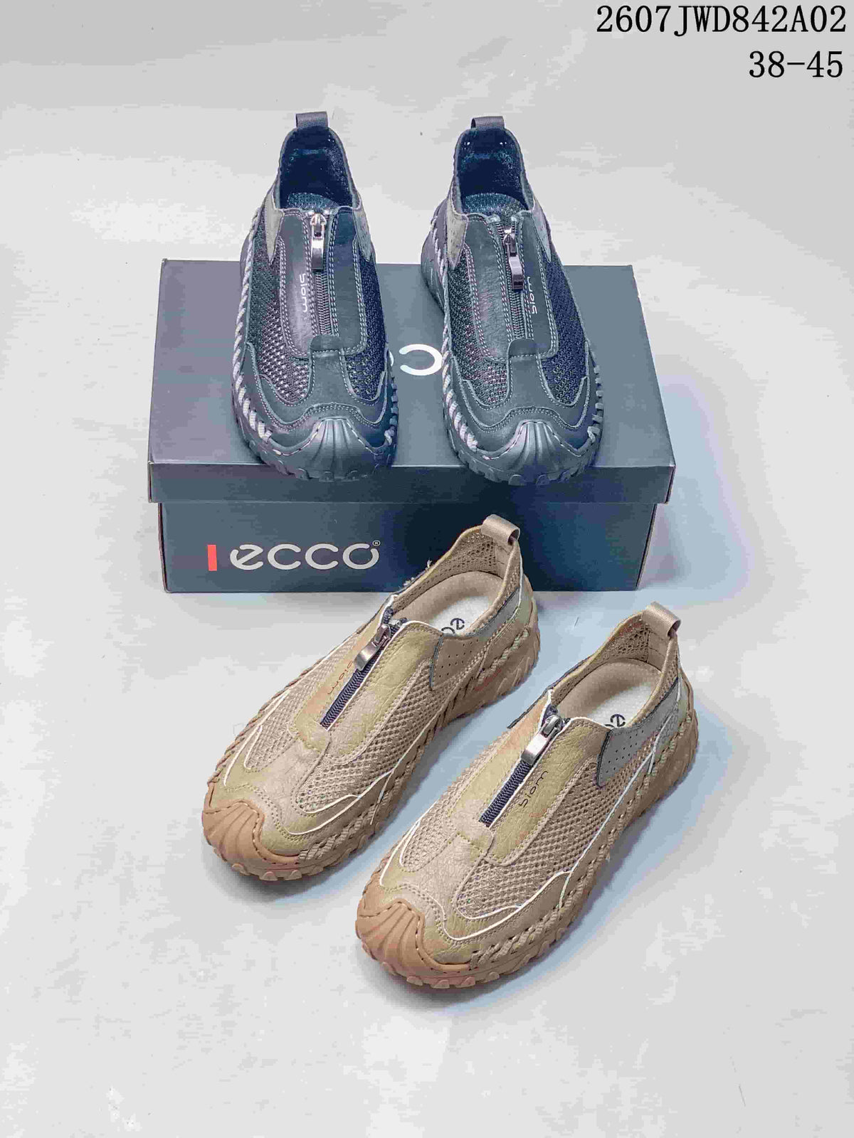 Charcoal gray and beige colorways of ECCO zip-front casual shoes displayed together.