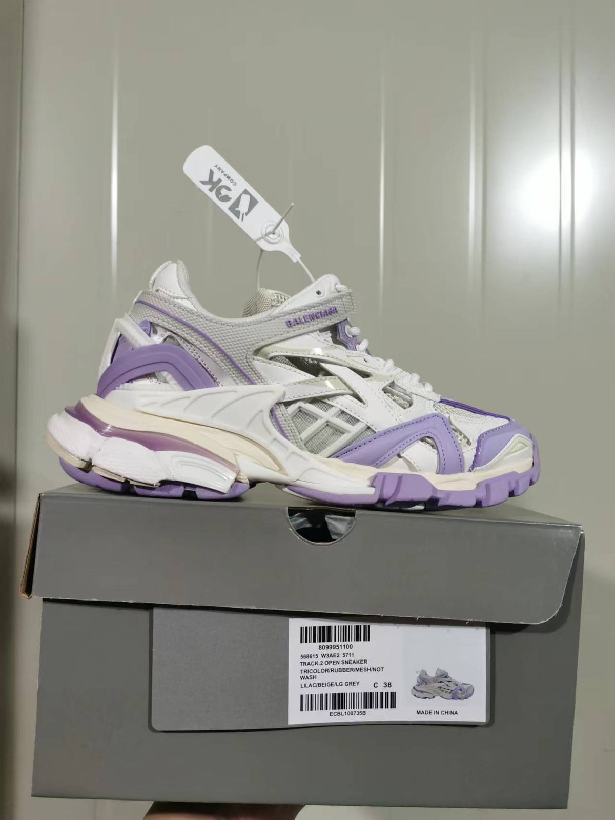 Balenciaga Track 2.0 open sneaker displayed on its box, with the box label showing color details and sample size C 38.