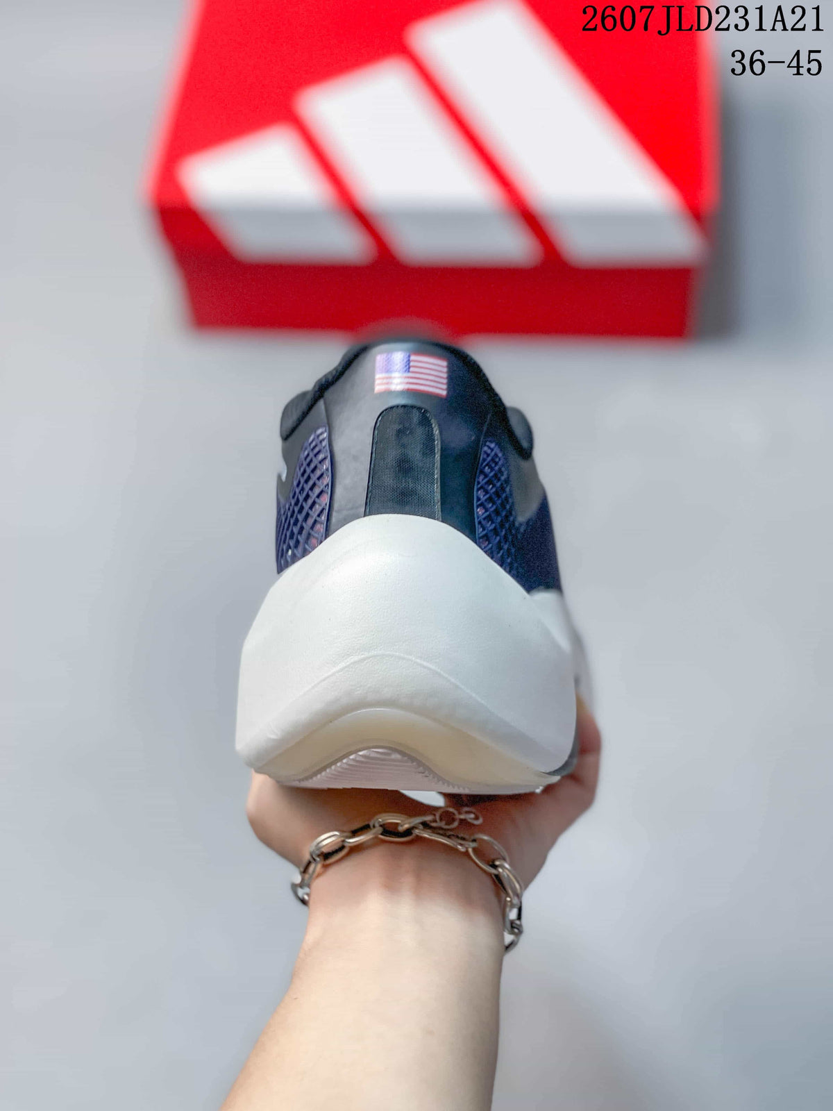 Rear view showing the padded heel, dark upper, and sculpted white outsole.