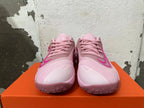 Front view of pink Nike Precision 7 basketball shoes with bright pink Swoosh accents