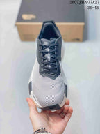 Top view showing the breathable mesh toe box, dark laces, and contrasting upper panels.