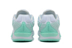 Rear view of white and mint-green Nike Sabrina basketball shoes
