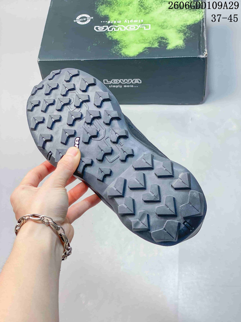 Close-up of the shoe's lugged outsole