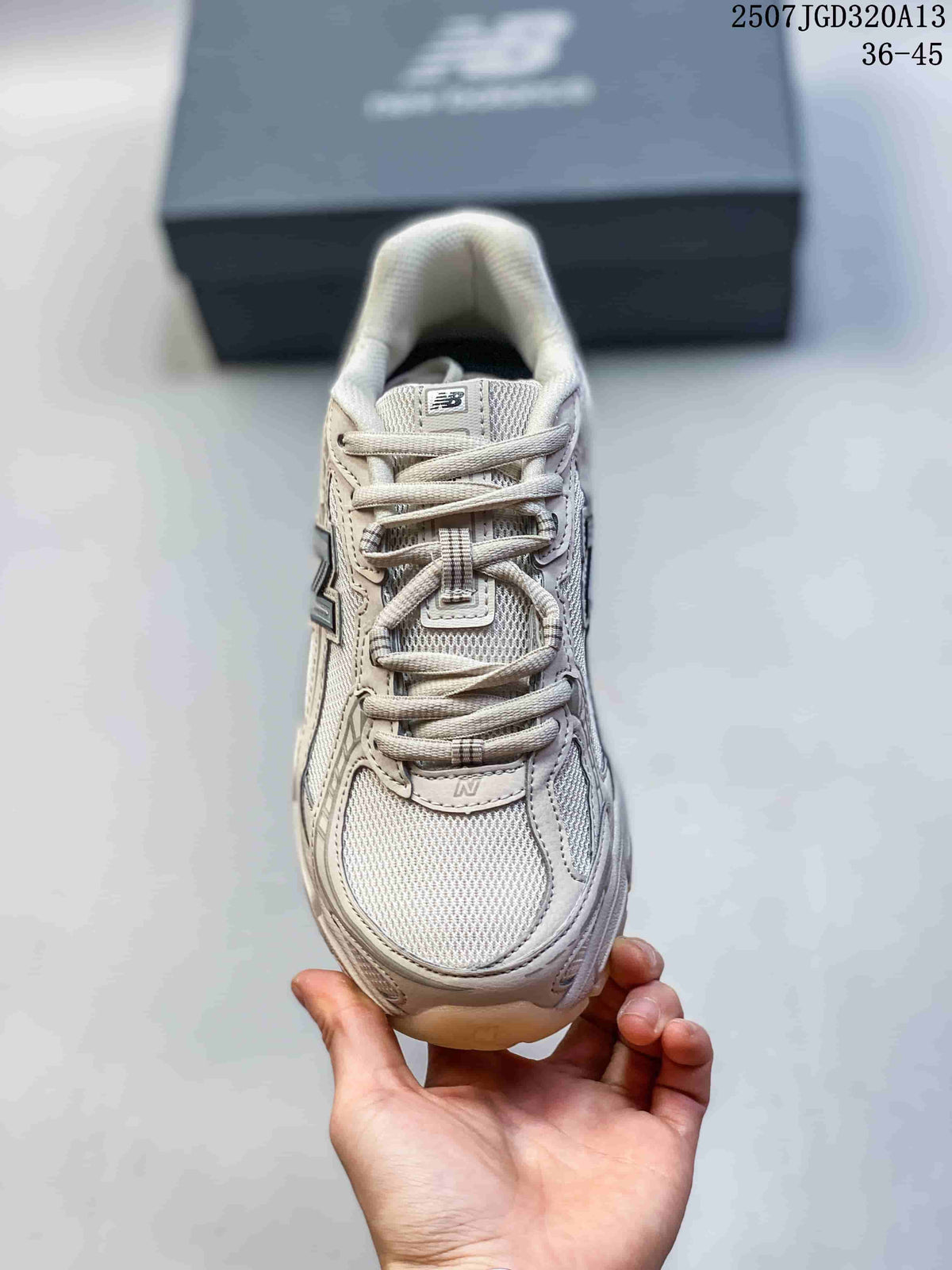 Top view of the cream sneaker showing the mesh toe box, layered overlays and laces.