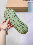Close-up of the sneaker outsole showing a raised lug tread