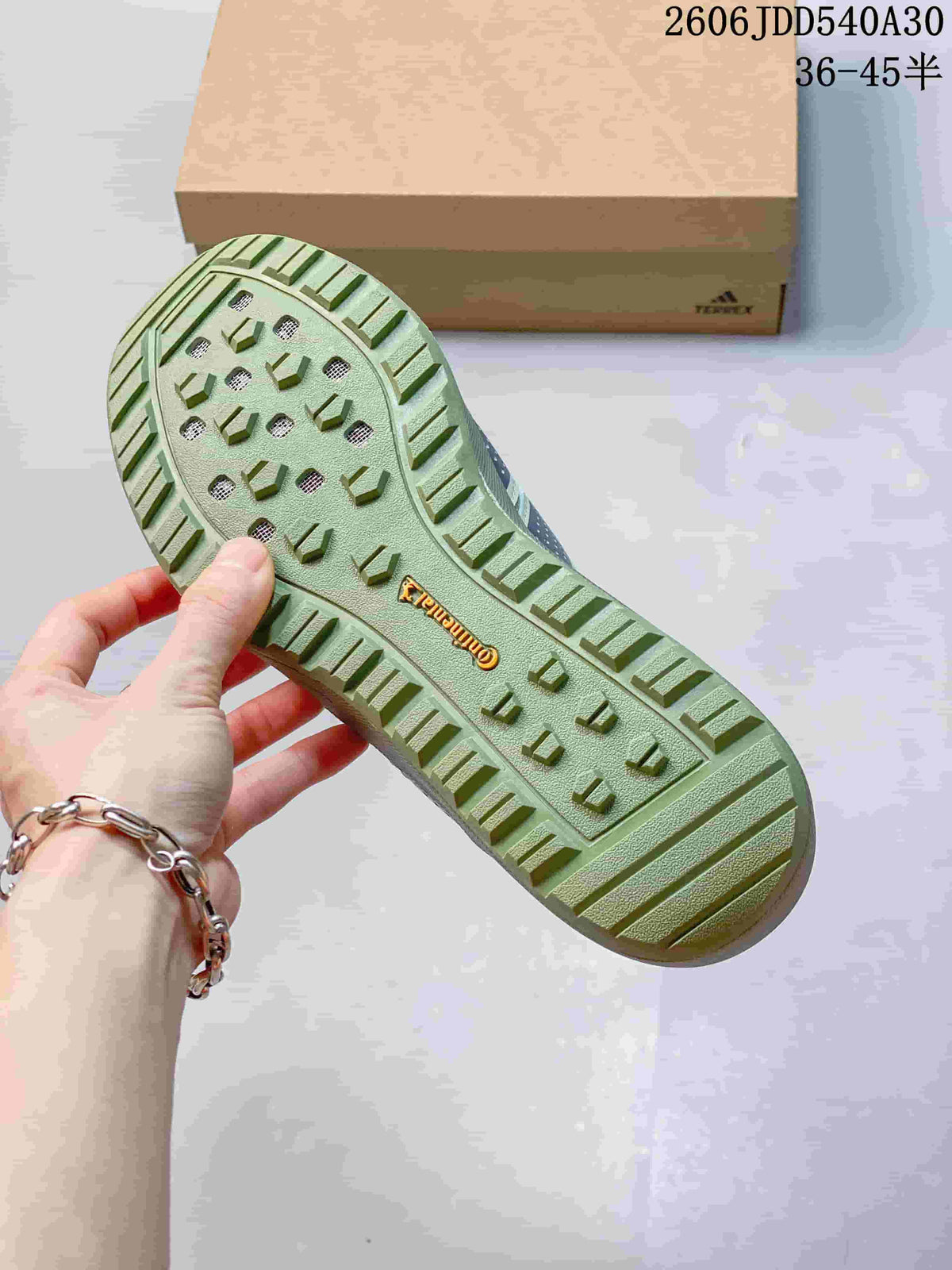 Close-up of the sneaker outsole showing a raised lug tread