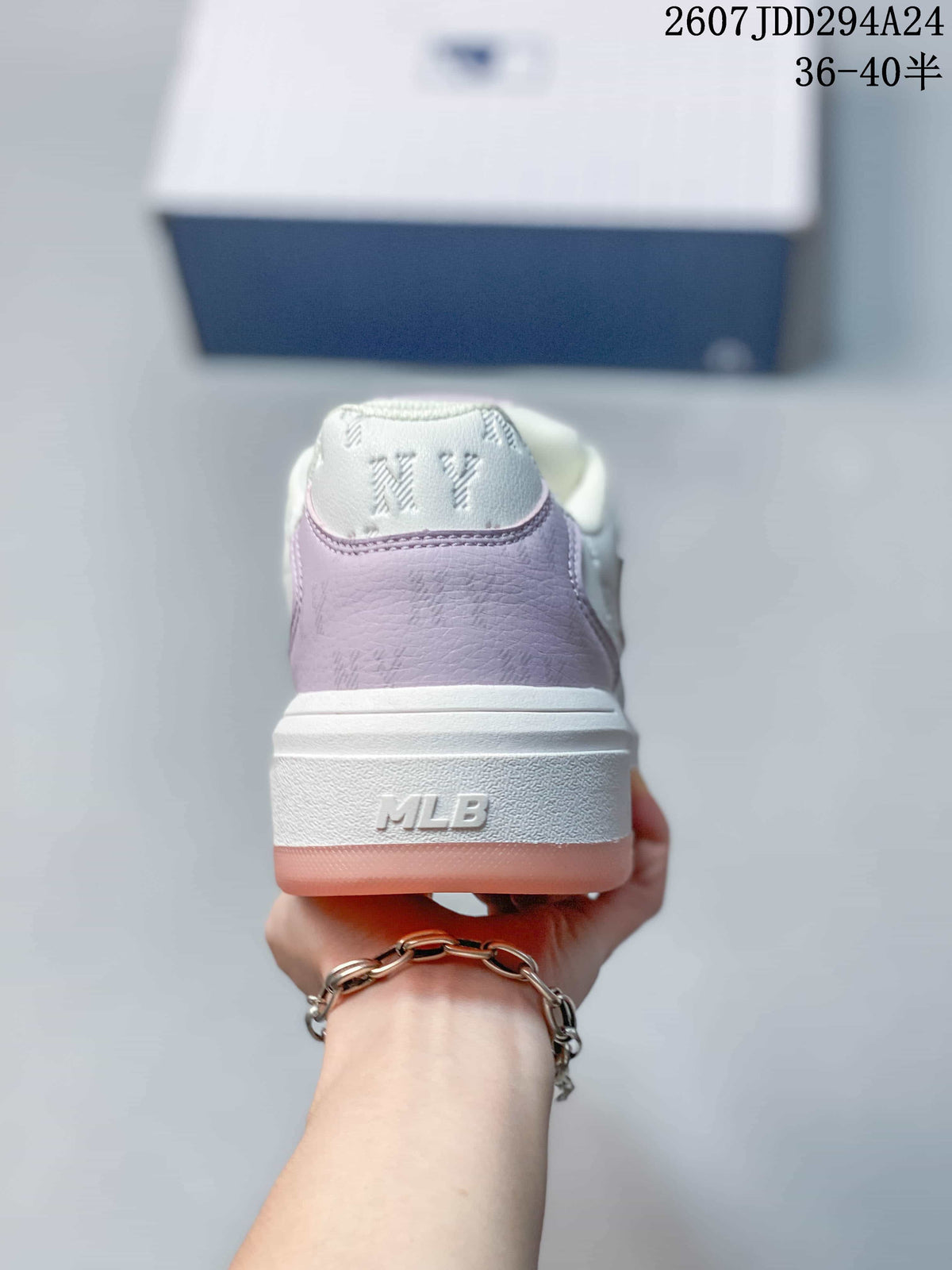 Rear view of the sneaker showing the lavender heel panel, white midsole, pink outsole, and MLB branding.