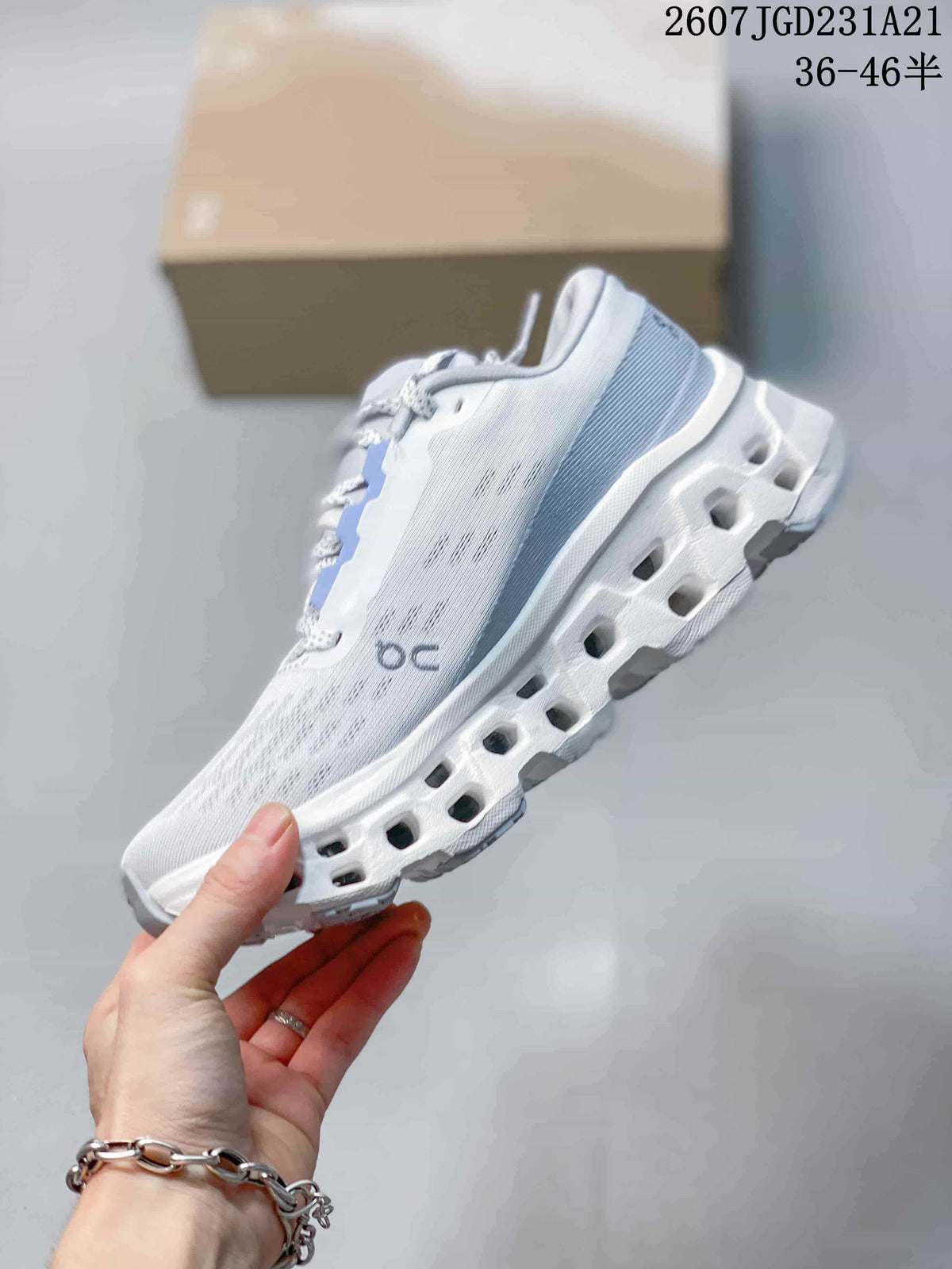 Side view highlighting the pale upper, On branding, and segmented sole openings.
